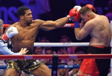 Anthony Joshua pictured on the left during his bout against Kristian Prenga.