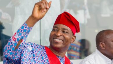Bernard Antwi-Bosiako (Wontumi), dressed in traditional red and blue attire