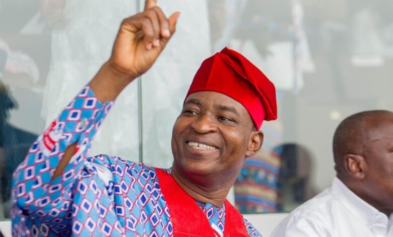 Bernard Antwi-Bosiako (Wontumi), dressed in traditional red and blue attire