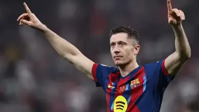 Robert Lewandowski celebrates after scoring for Barcelona.