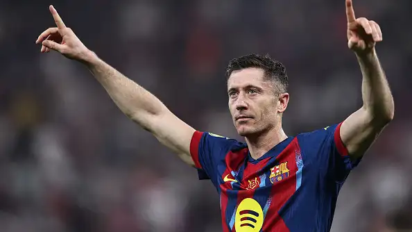 Robert Lewandowski celebrates after scoring for Barcelona.