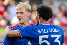Ethan Williams celebrates after scoring Manchester United's fifth goal