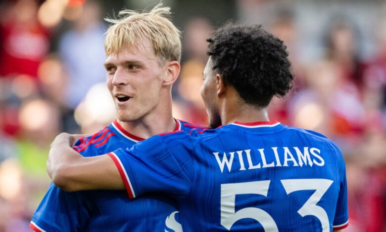 Ethan Williams celebrates after scoring Manchester United's fifth goal
